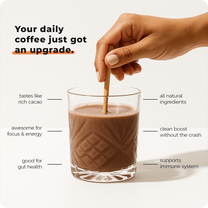 Glass of chocolate drink with a hand stirring it, text highlighting benefits on a white background: tastes like rich cacao, awesome for focus and energy, good for gut health, all natural ingredients, clean boost without the crash, supports immune system
